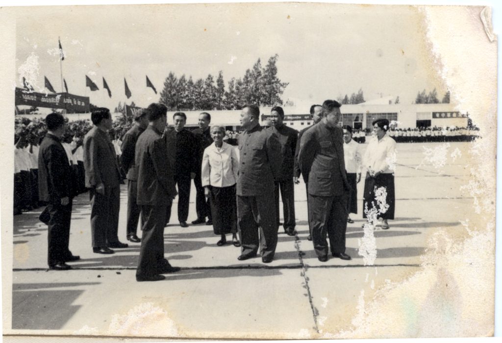 Senior Leaders of Democratic Kampuchea (DK) waiting for the arrival of the Chinese delegation at the Po-chen-tong (now known as Phnom Penh) International Airport, Phnom Penh. Chinese Ambassador to DK, Sun Hua, is standing second from the left. DK senior leaders from right to left: Ieng Thirith, Minister of Social Affairs; Yun Yat, Minister of Education and Culture; Pol Pot; Ieng Sary, Minister of Foreign Affairs; Vorn Vet, Minister of Economics; Nuon Chea, President of People's Assembly and Khieu Ponnary. Others are unidentified.  Circa: 1977. Source: Documentation Center of Cambodia Archive
